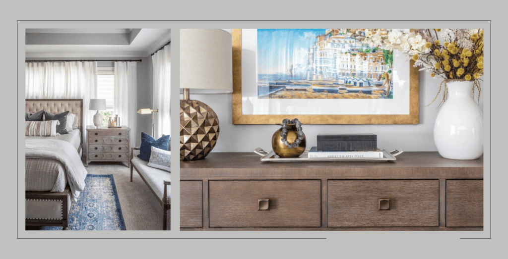 Bedroom with upholstered bed frame and blue carpet. Painting in gold frame with gold lamp.