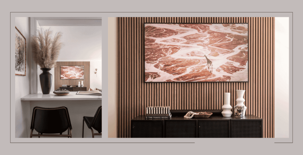 Black stools, reeded wall with giraffe on TV.