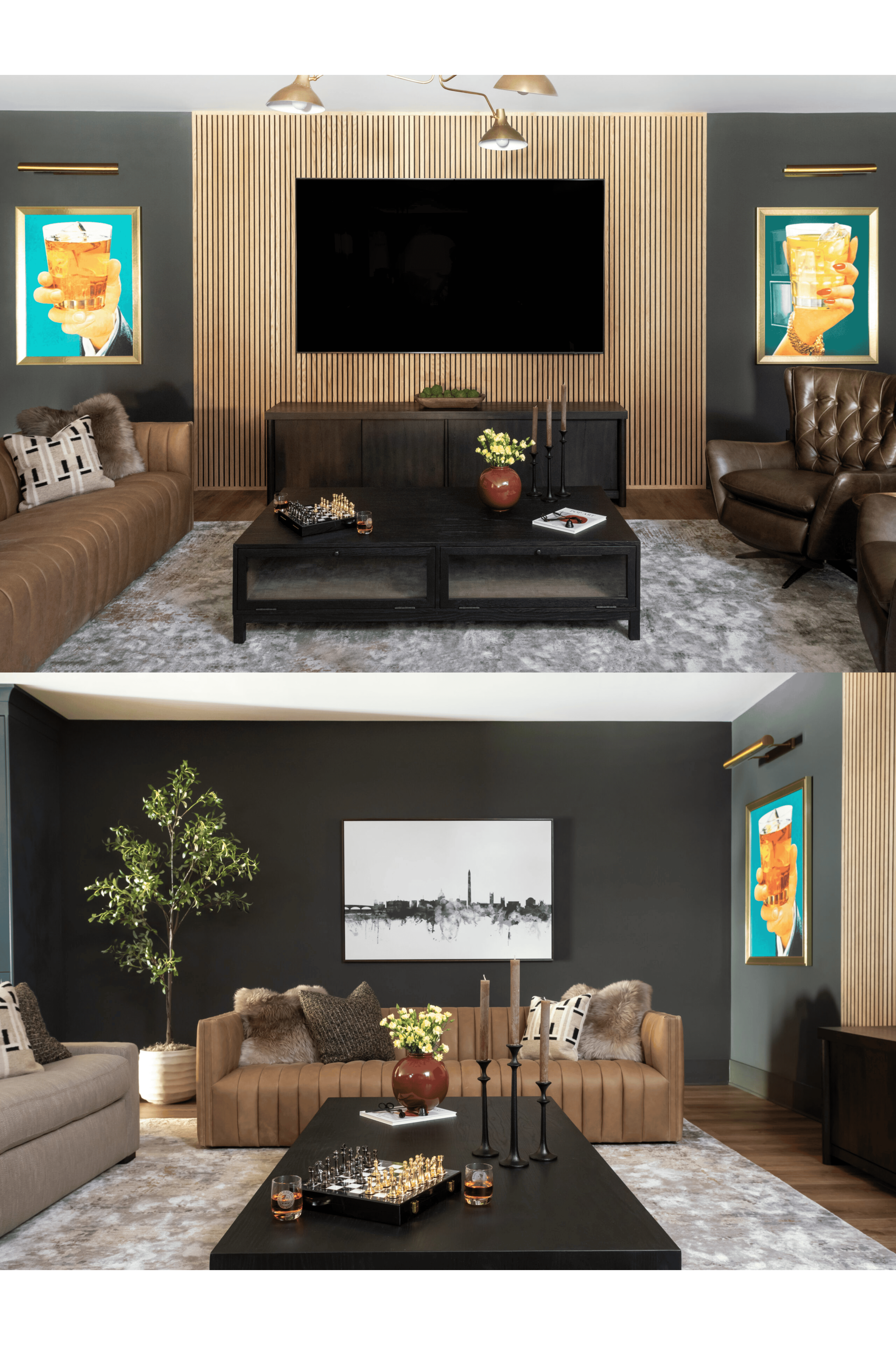 A modern living room featuring a large wall-mounted flat-screen TV at the center, framed by vertical wooden slats. On either side of the TV are two framed art pieces showing hands holding drinks. The room is furnished with a brown leather couch adorned with a geometric patterned pillow, a leather armchair, and a dark wooden coffee table. The table has a chess set, a red vase with flowers, and a few other decorative items. The space is accented with a light fixture overhead with multiple gold-colored lamps, and the overall ambiance is stylish and cozy.